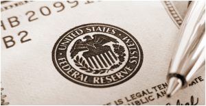 Fed mantiene tasas de interés cerca de cero al menos hasta 2023