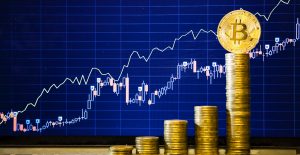 Bitcoin alcanza máximo de 67 mil dólares, un día después de su debut en la bolsa